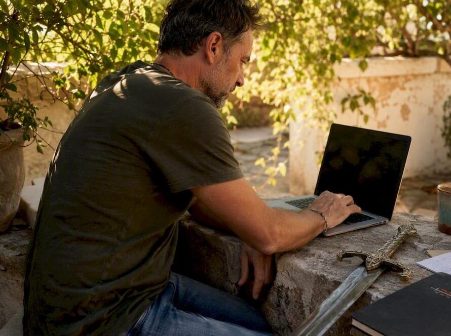 User browsing replica swords online at home